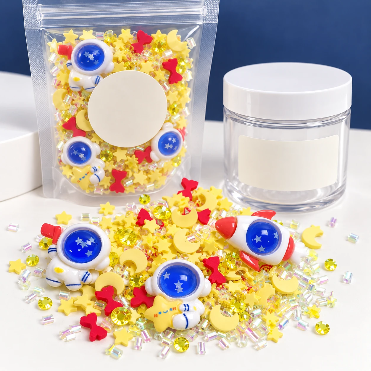 Astronaut & Yellow Star Filler Mix with a clear pouch and sample jar for private-label packaging, SLM23283