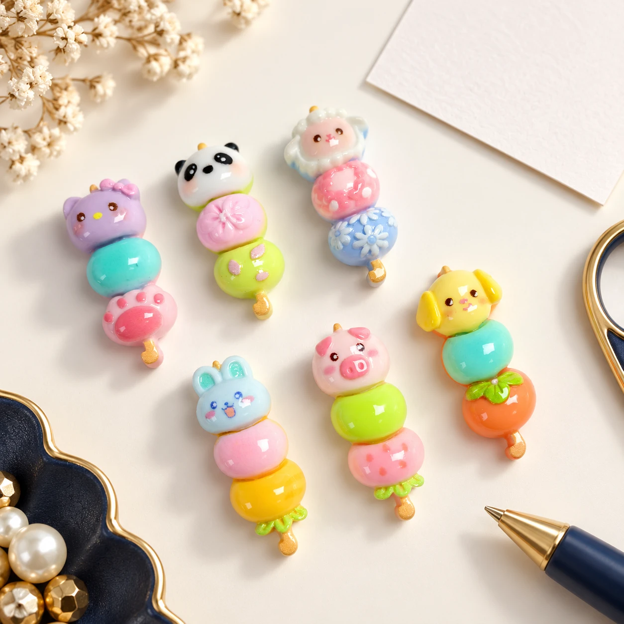 Animal Face Skewer Resin Charms RW003333 in an illustrative craft workspace