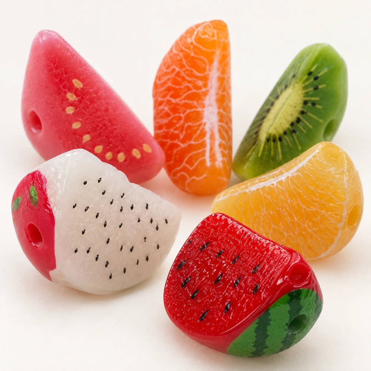 Assorted Fruit Wedge Resin Charms RW0027019 close-up showing the decorative shape and finish