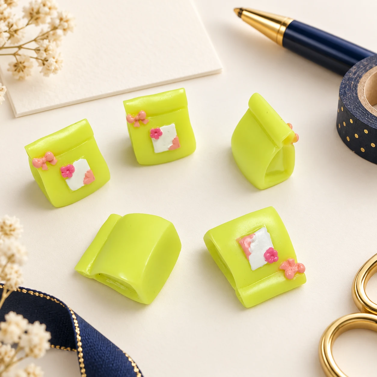 Blossom Gift Bag Resin Charms RW001877 in an illustrative craft workspace