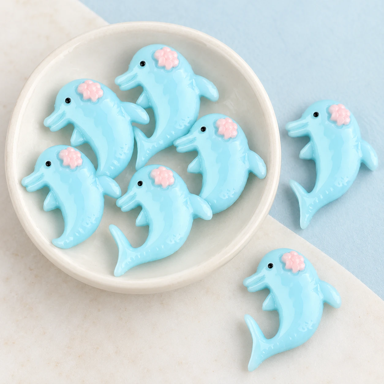 Blue Dolphin Resin Charm RW001078 displayed for assortment selection