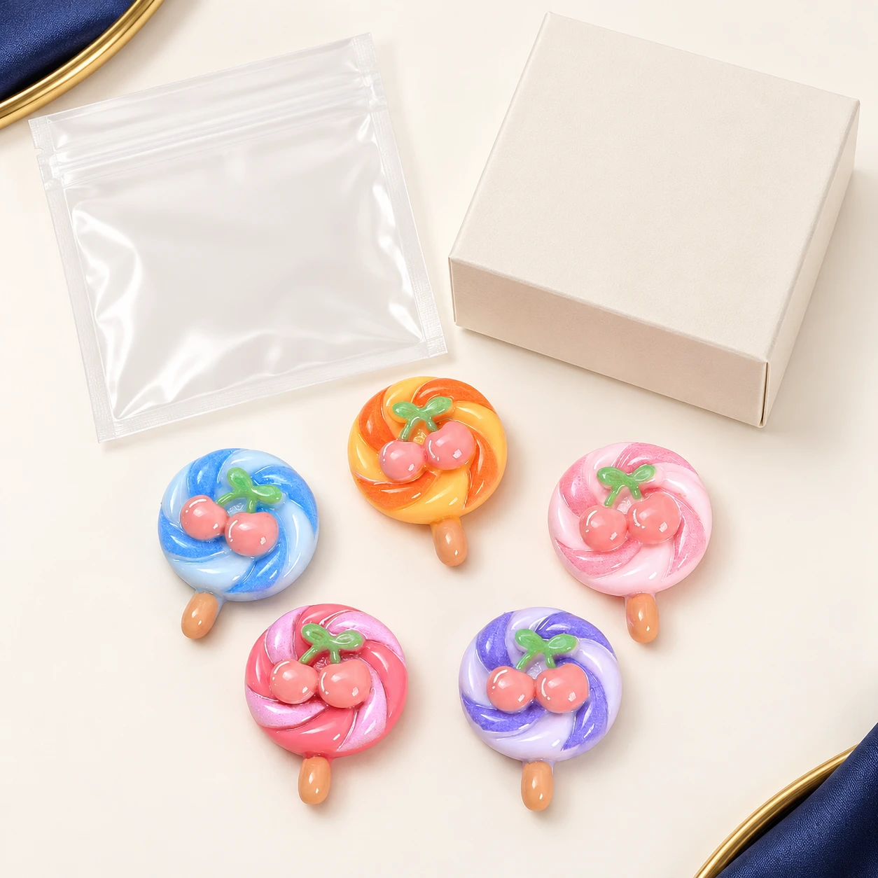 Cherry Swirl Lollipop Resin Charms RW003313 with illustrative private-label packaging