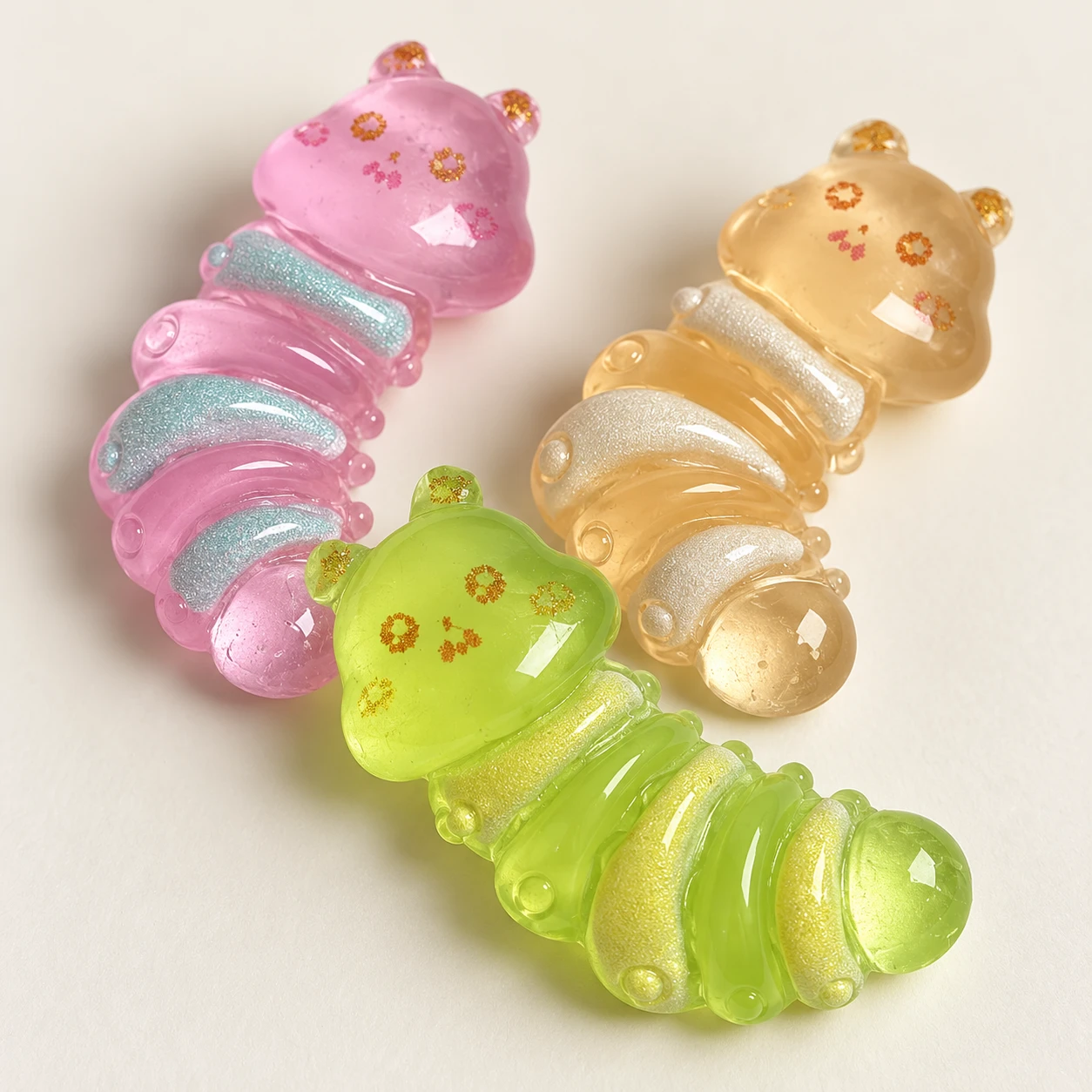 Colorful Caterpillar Resin Charms RW001391 close-up showing the decorative shape and finish