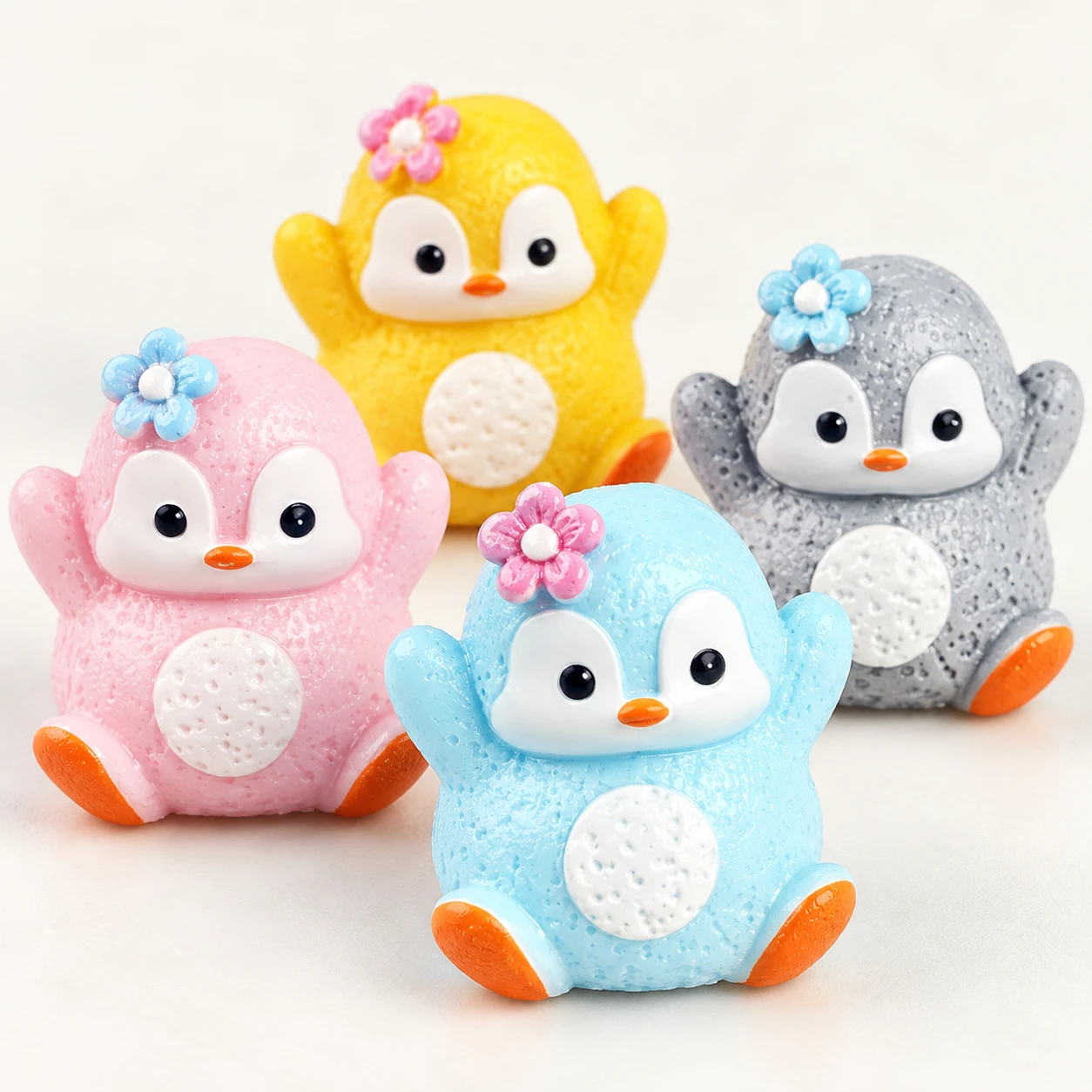 Colorful Penguin Resin Miniatures RW003398 close-up showing the decorative shape and finish