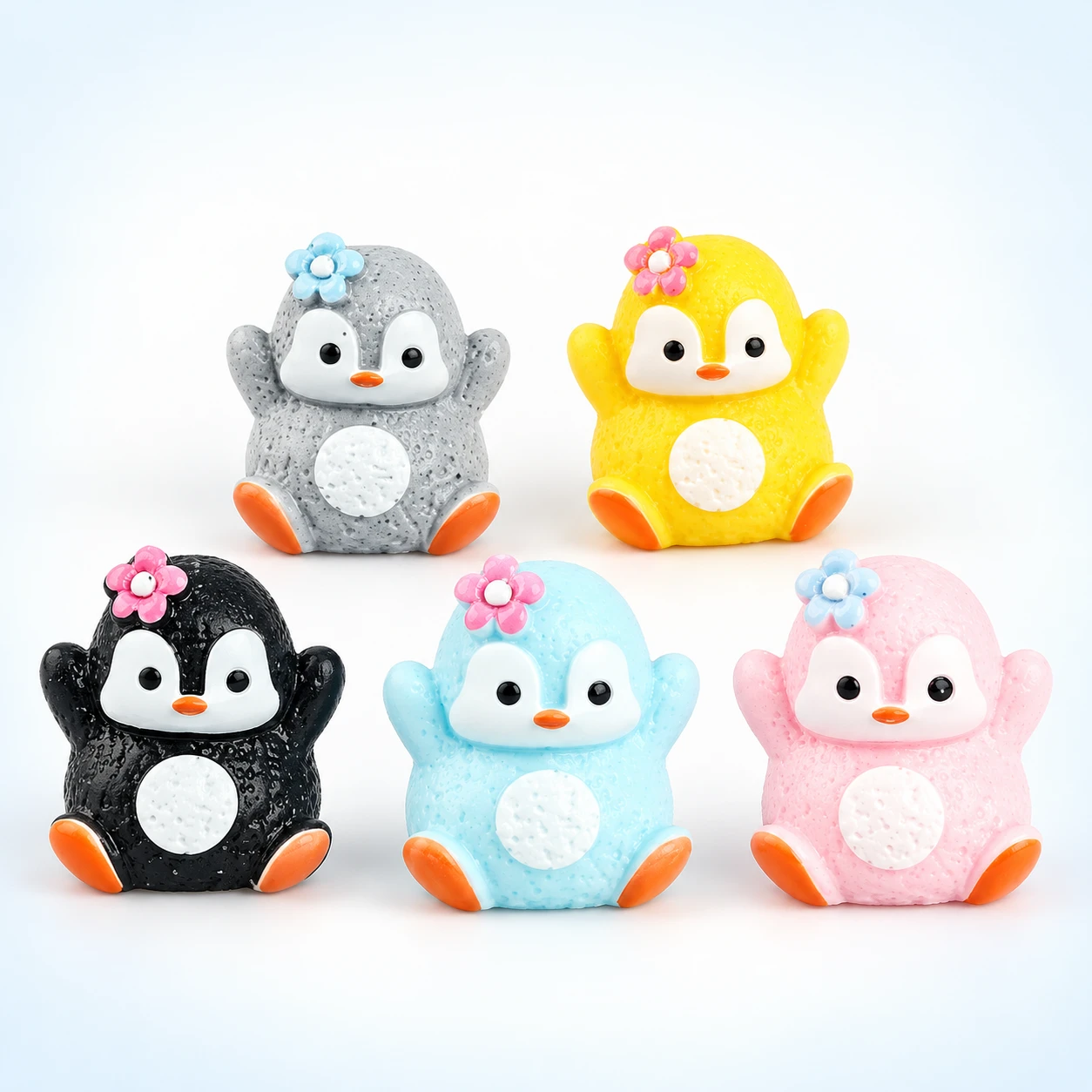 Colorful Penguin Resin Miniatures RW003398 on a clean light studio background