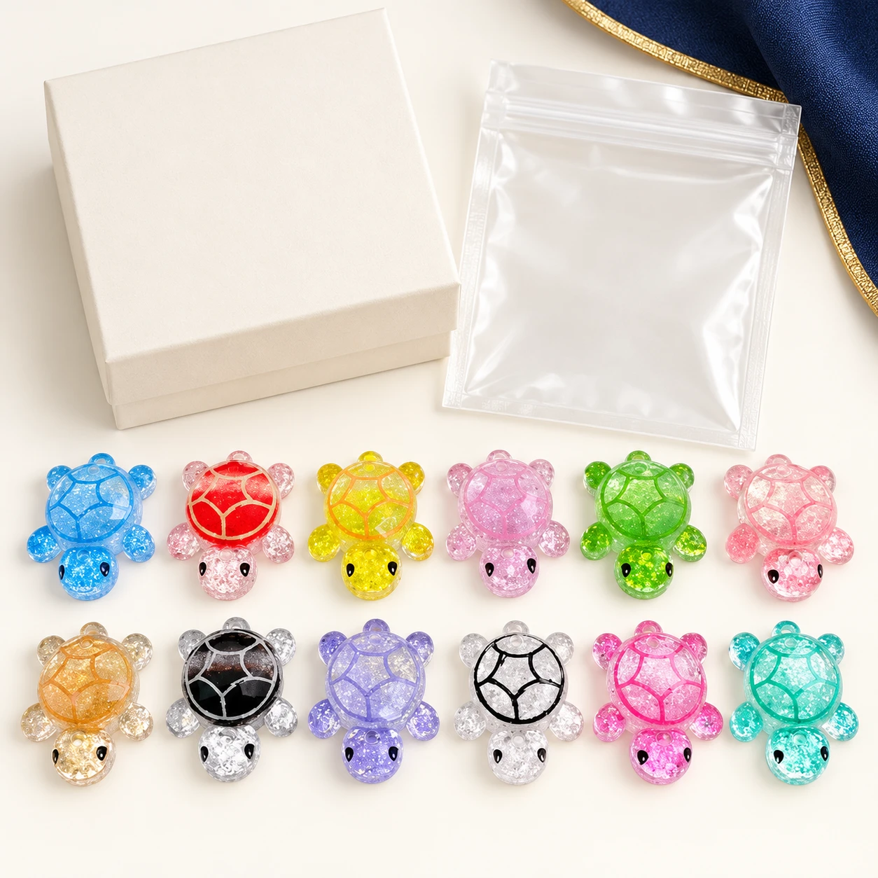 Glitter Shell Turtle Resin Charms RW26057-2 with illustrative private-label packaging