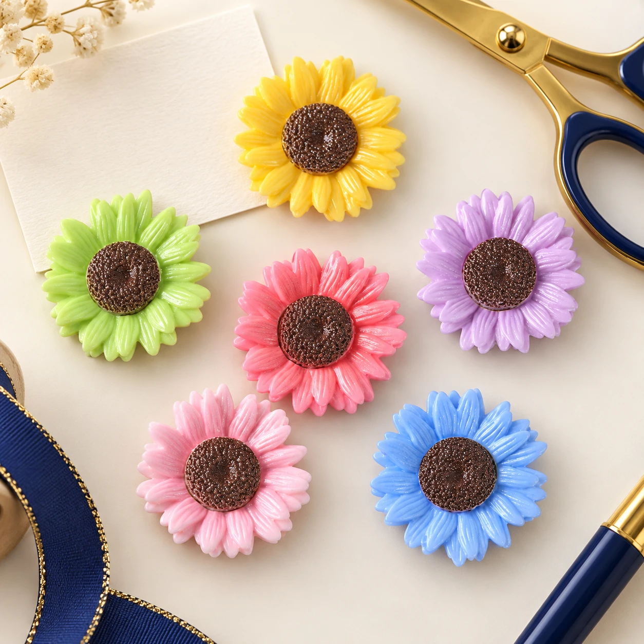 Glitter Sunflower Resin Cabochons RW001904 in an illustrative craft workspace