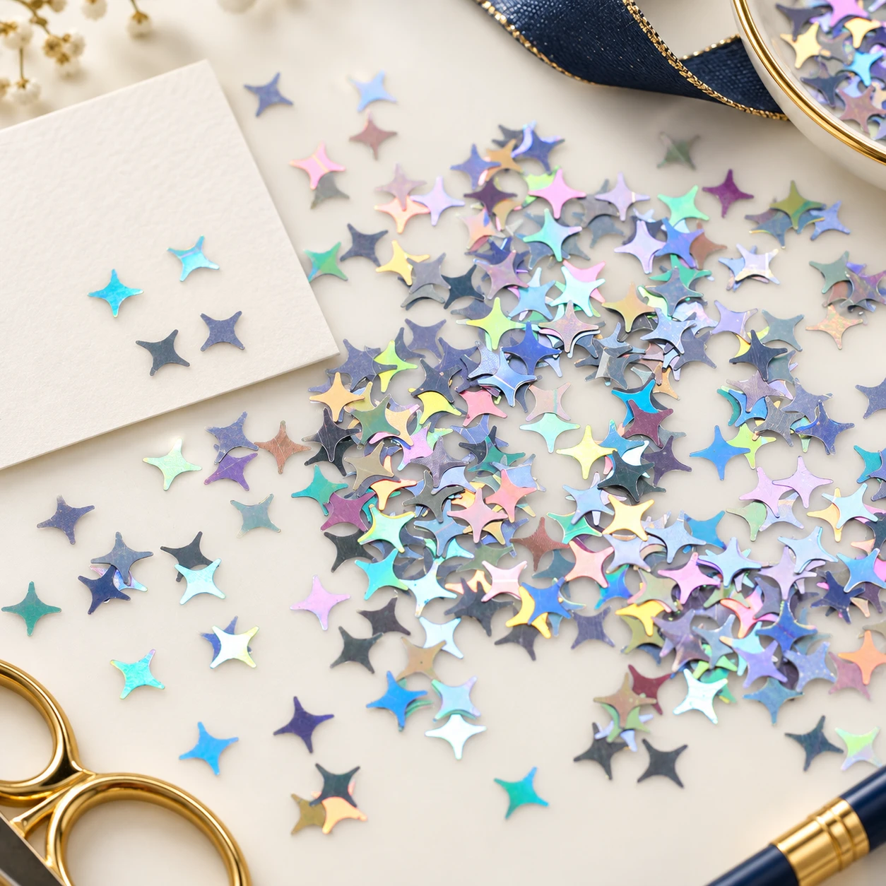 Iridescent Four-Point Star Sequins MA033 in an illustrative craft workspace