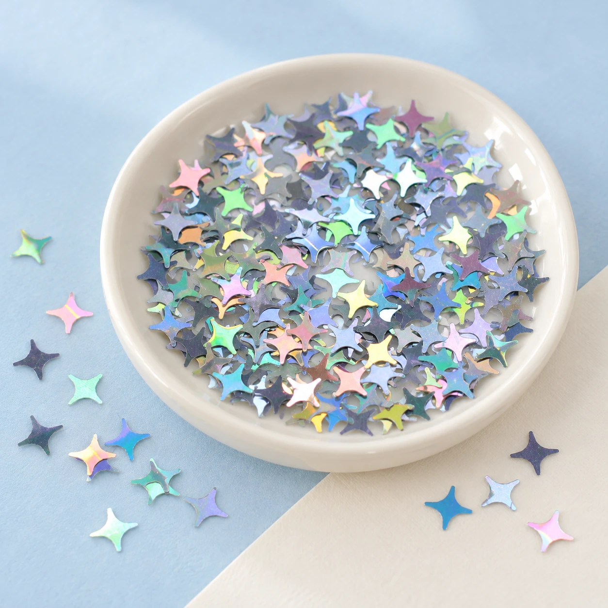 Iridescent Four-Point Star Sequins MA033 displayed for assortment selection