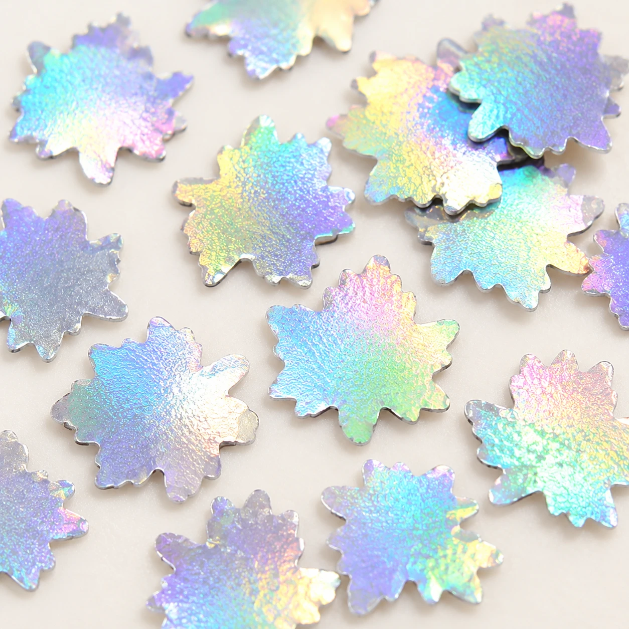 Iridescent Maple Leaf Sequins MA068 close-up showing the decorative shape and finish
