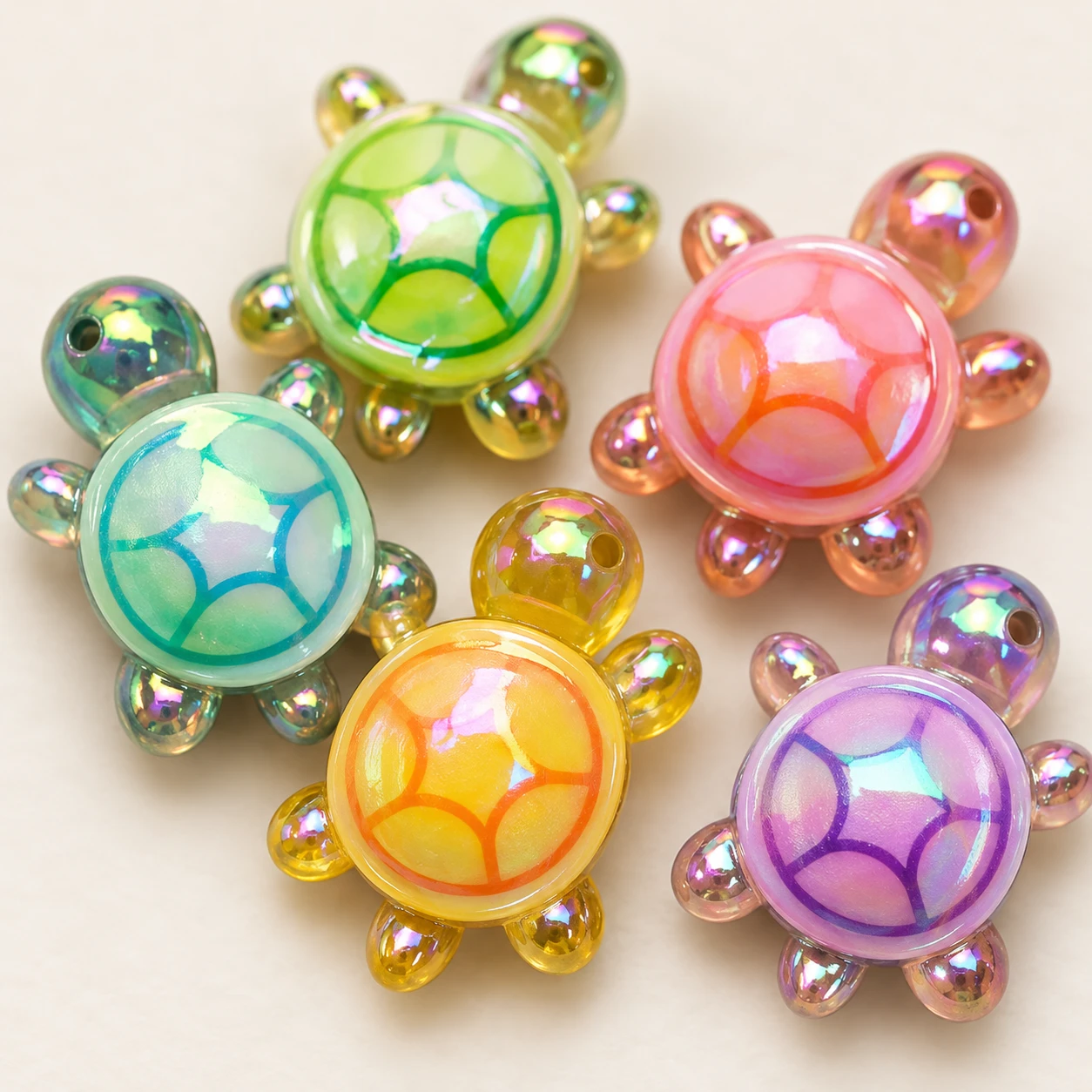 Iridescent Mini Turtle Resin Charms RW0026057 close-up showing the decorative shape and finish