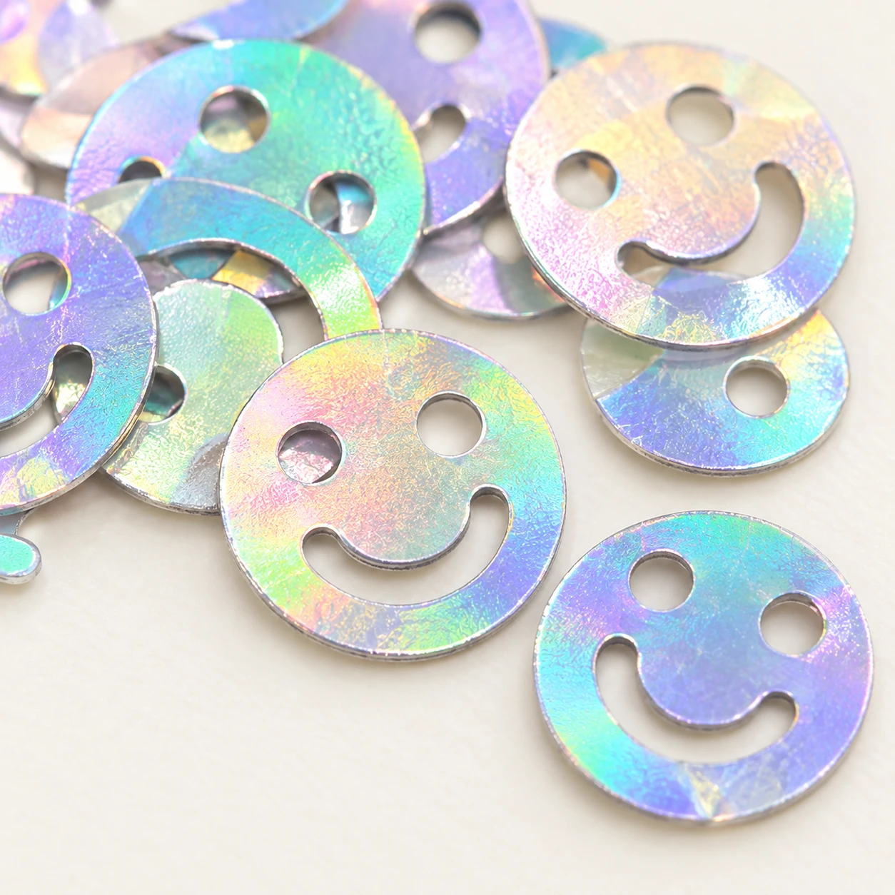 Iridescent Smiley Face Sequins MA069 close-up showing the decorative shape and finish