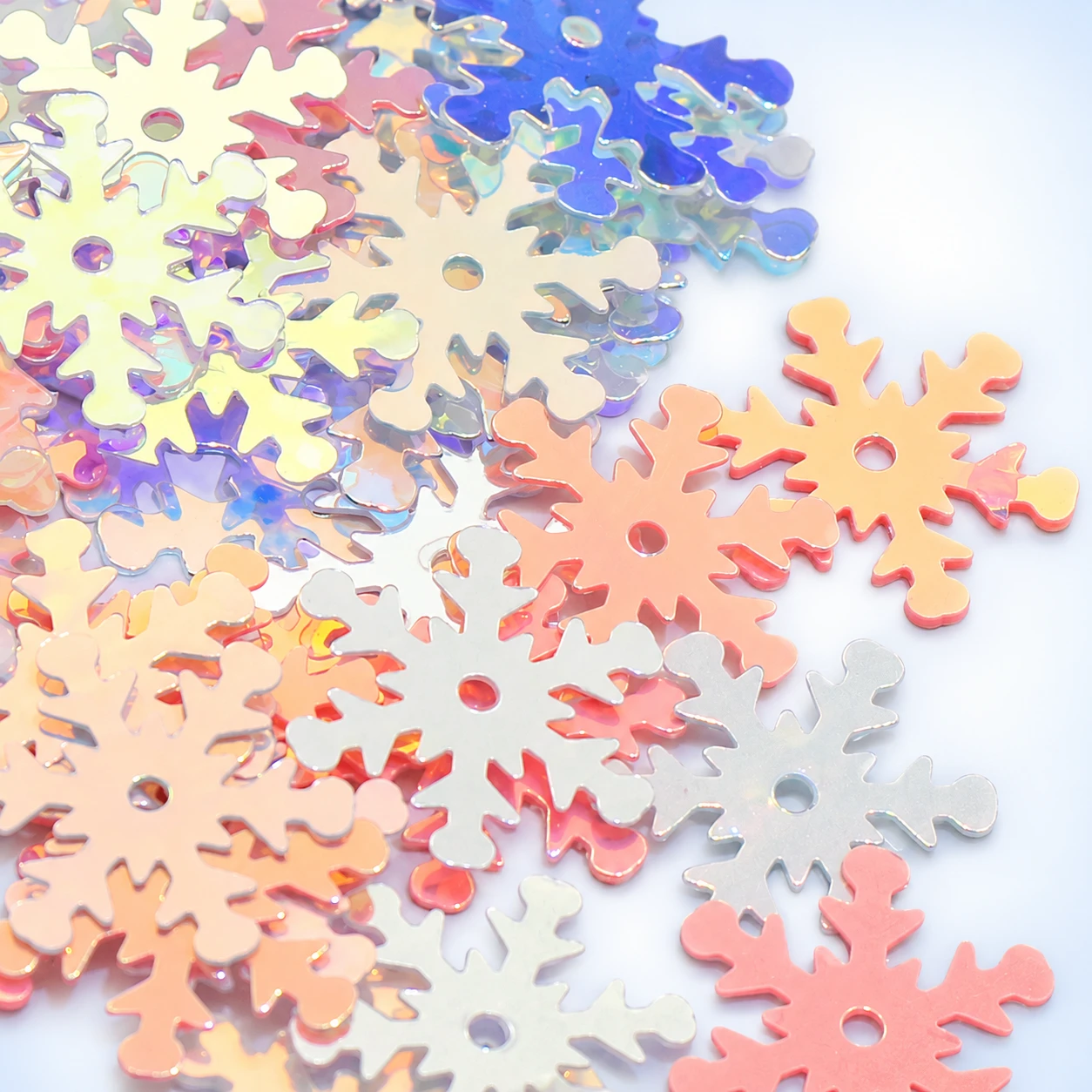 Large Iridescent Snowflake Sequins MA100 on a clean light studio background