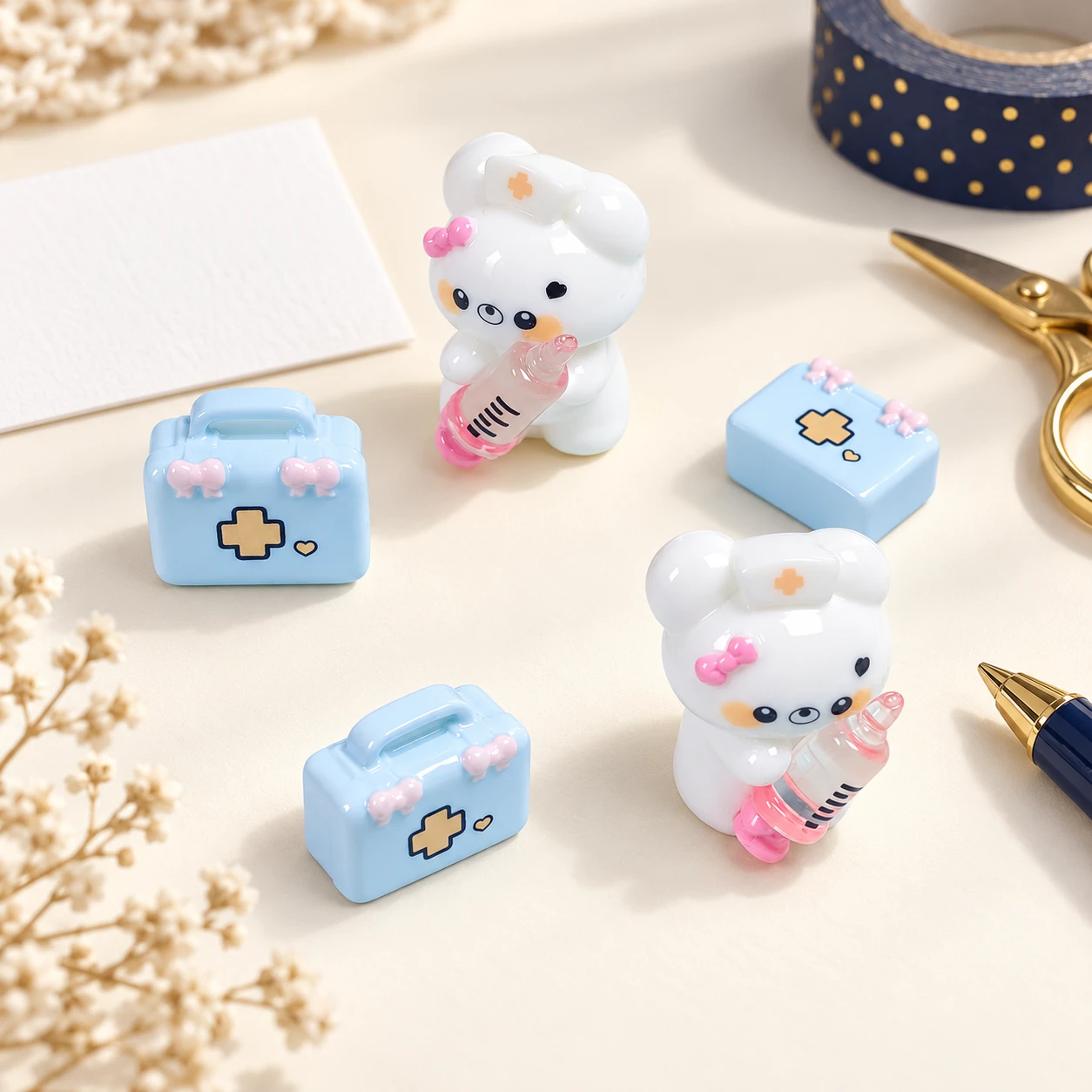 Medical Bear and Kit Resin Charms RW002078 in an illustrative craft workspace