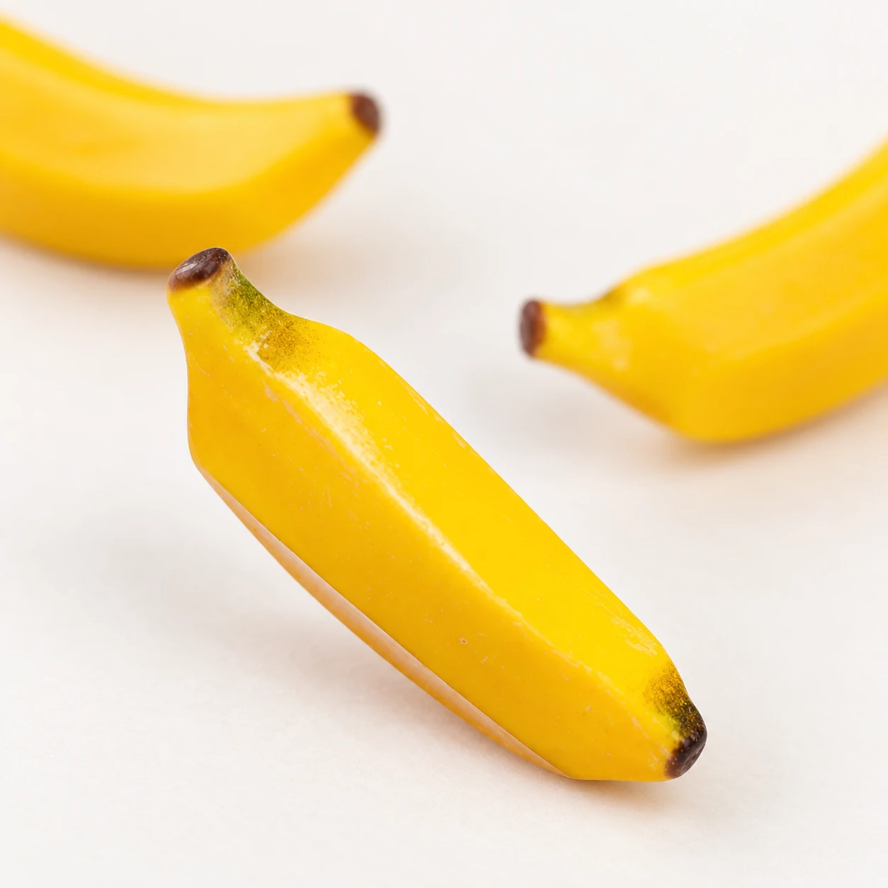 Mini Banana Resin Charms RW003268 close-up showing the decorative shape and finish