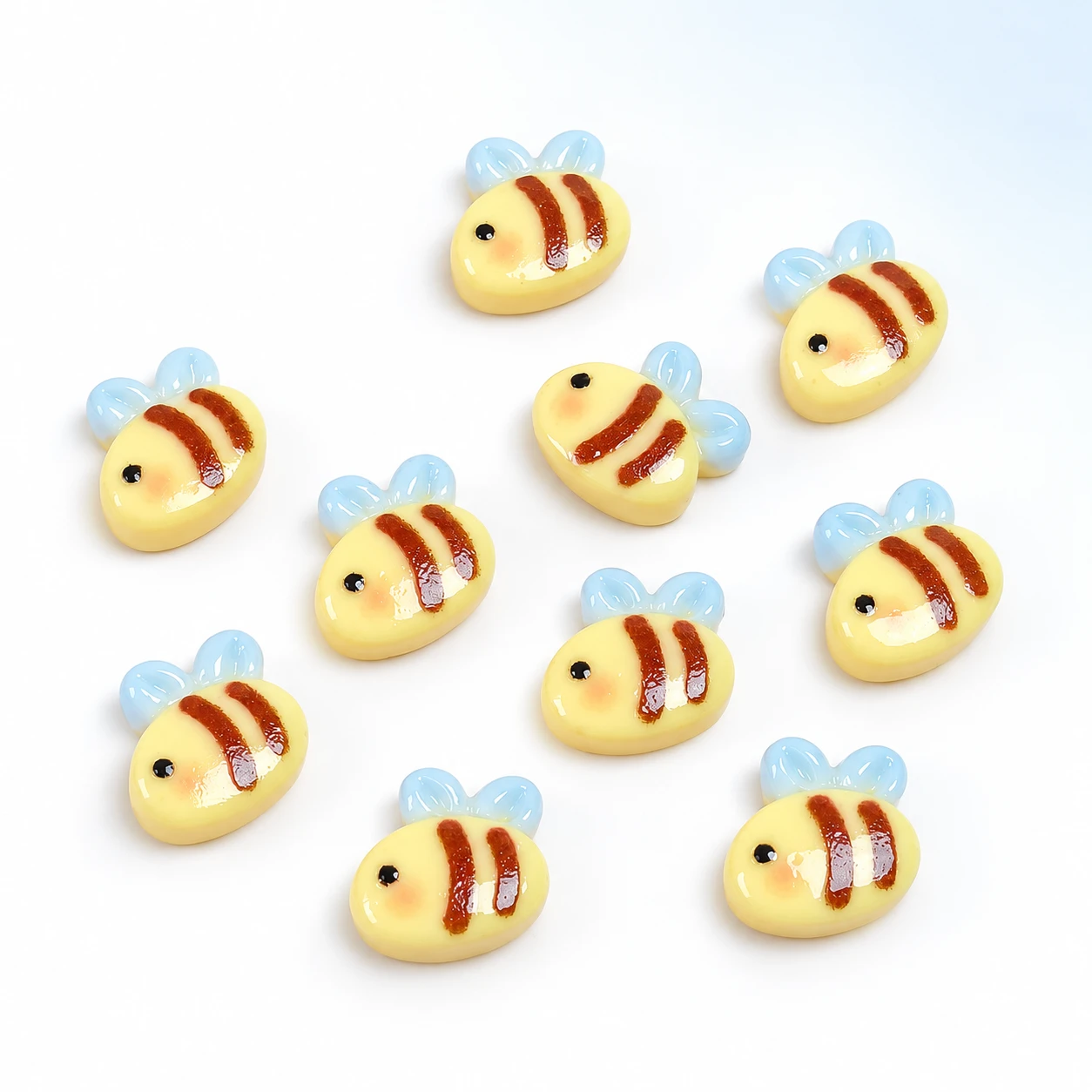 Mini Bee Resin Flatback Cabochons RW002498 on a clean light studio background