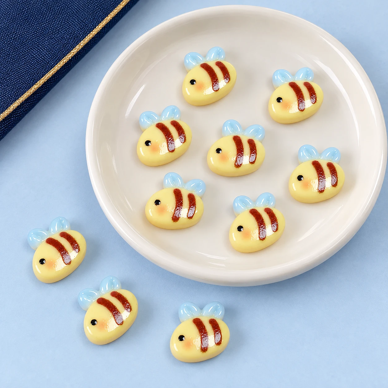 Mini Bee Resin Flatback Cabochons RW002498 displayed for assortment selection