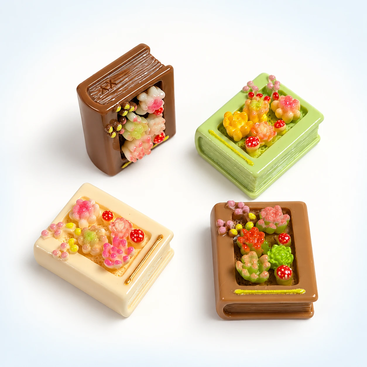 Mini Book and Succulent Resin Charms RW002201 / 26668 on a clean light studio background