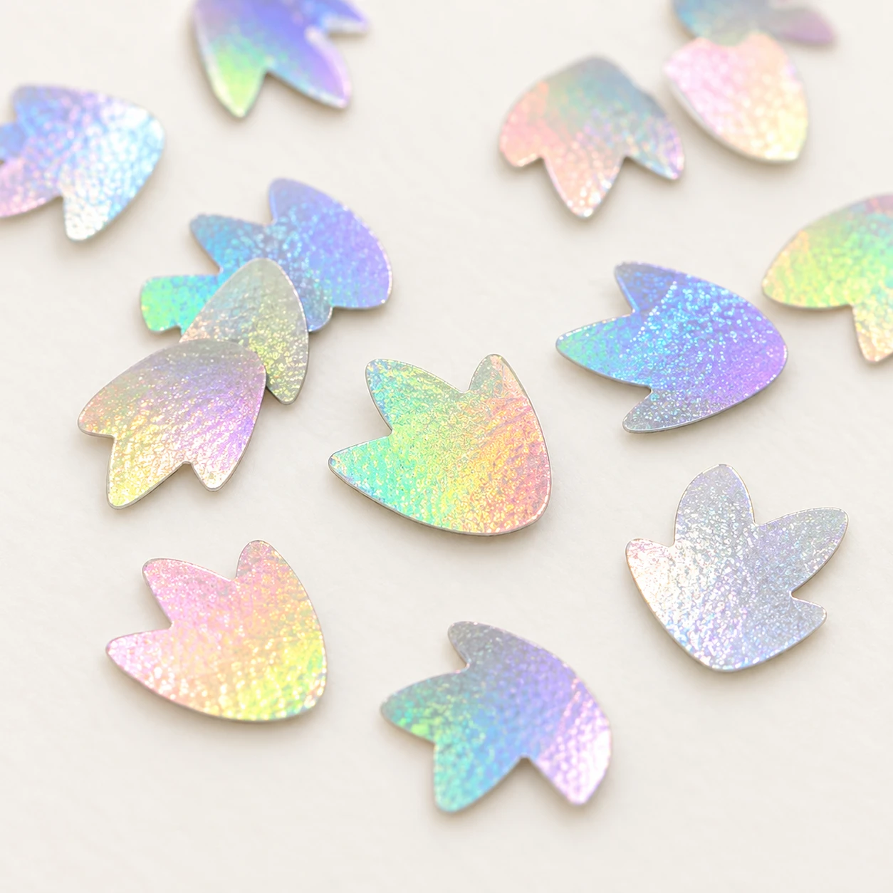Mini Iridescent Leaf Sequins MA066 close-up showing the decorative shape and finish