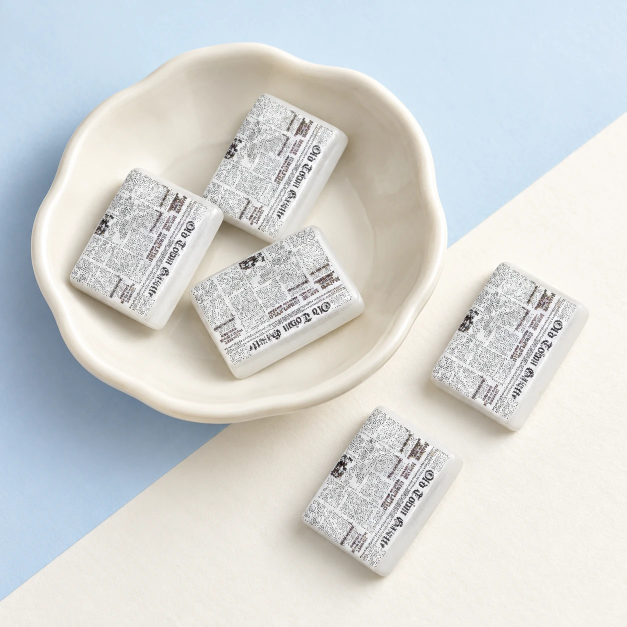Mini Newspaper Resin Charms RW001857 displayed for assortment selection