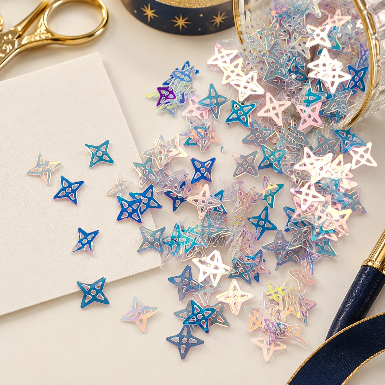 Openwork Holographic Star Sequins MA179 in an illustrative craft workspace