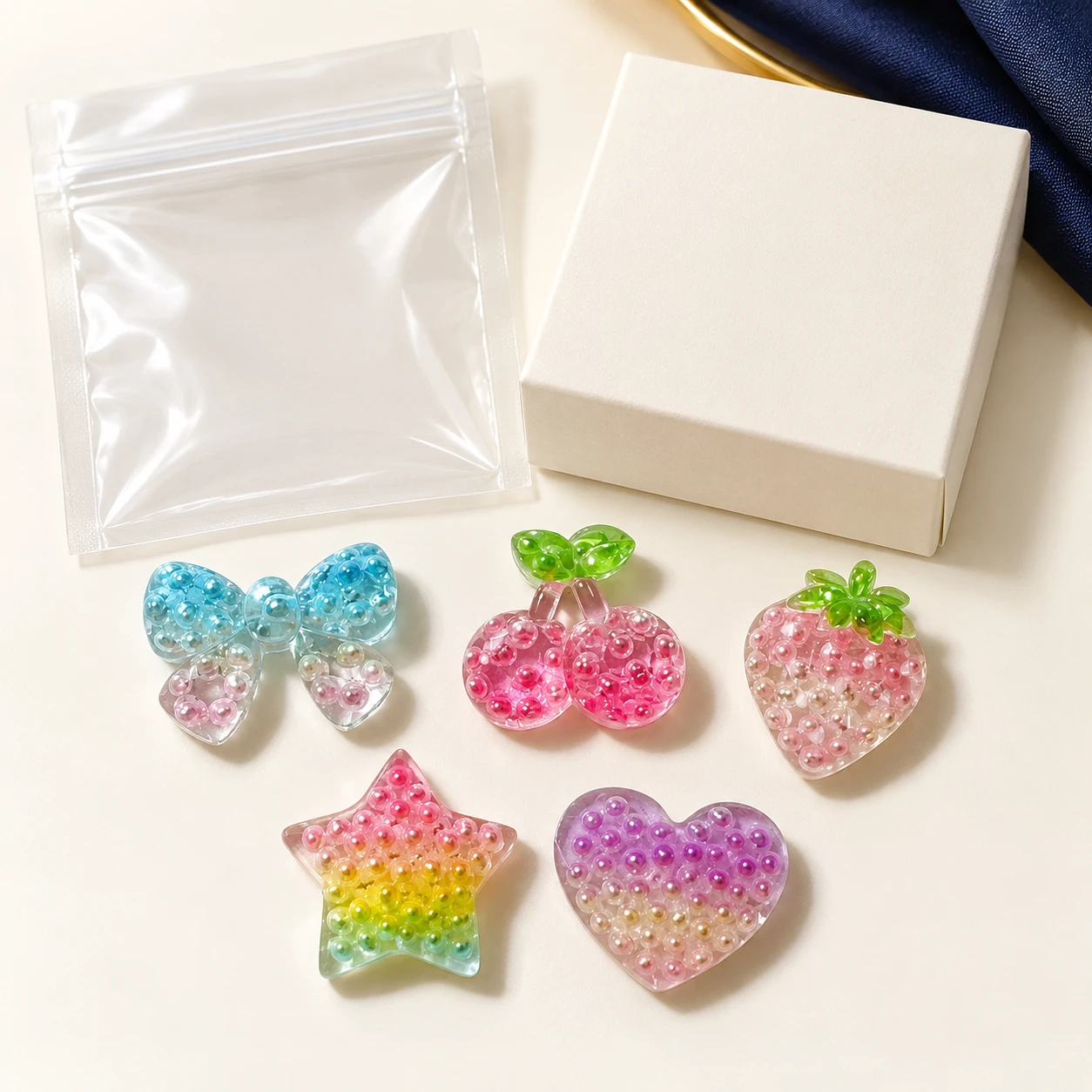 Pearl-Effect Fruit Heart and Star Resin Charms RW003334 with illustrative private-label packaging
