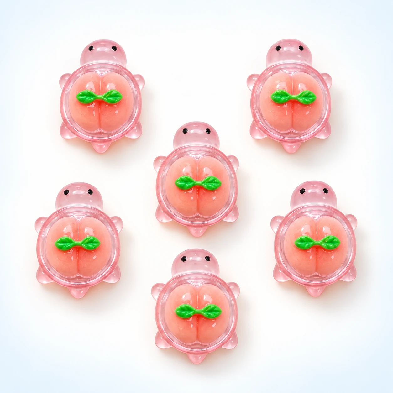 Pink Peach Turtle Resin Charms RW003390 on a clean light studio background