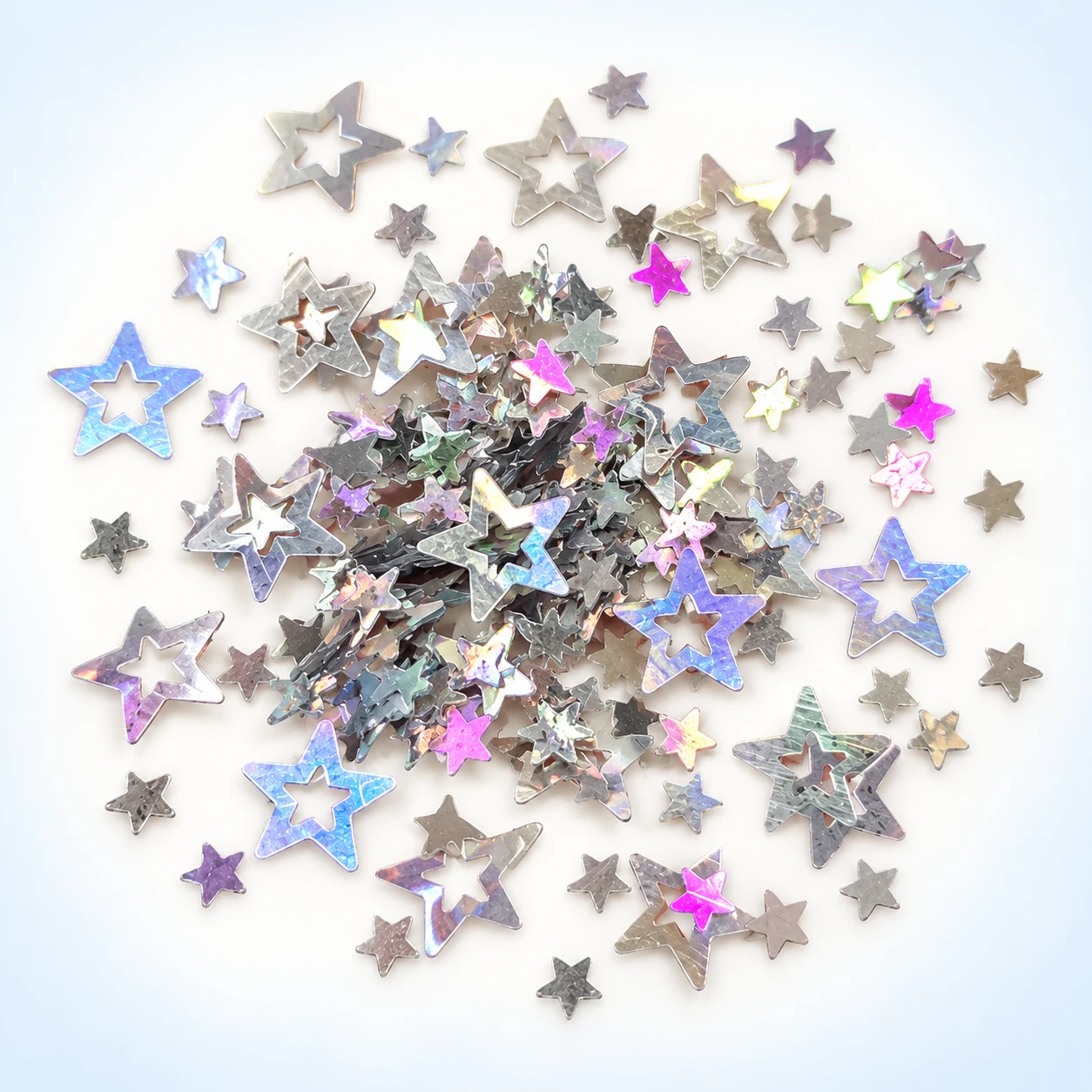 Silver Holographic Hollow Star Sequins MA174 on a clean light studio background