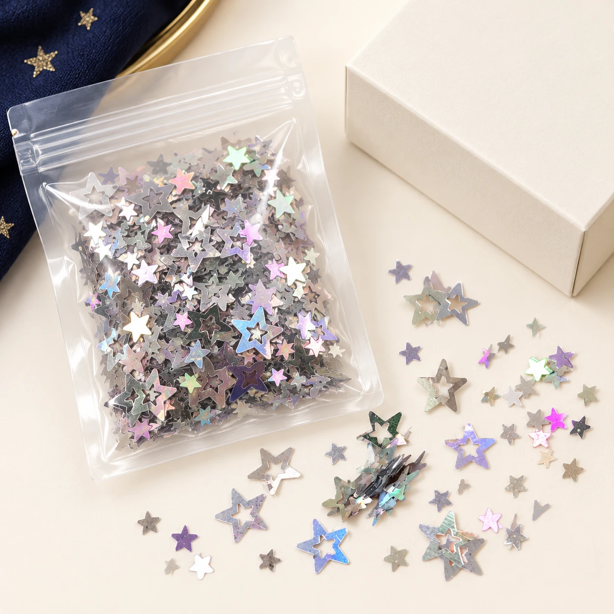 Silver Holographic Hollow Star Sequins MA174 with illustrative private-label packaging