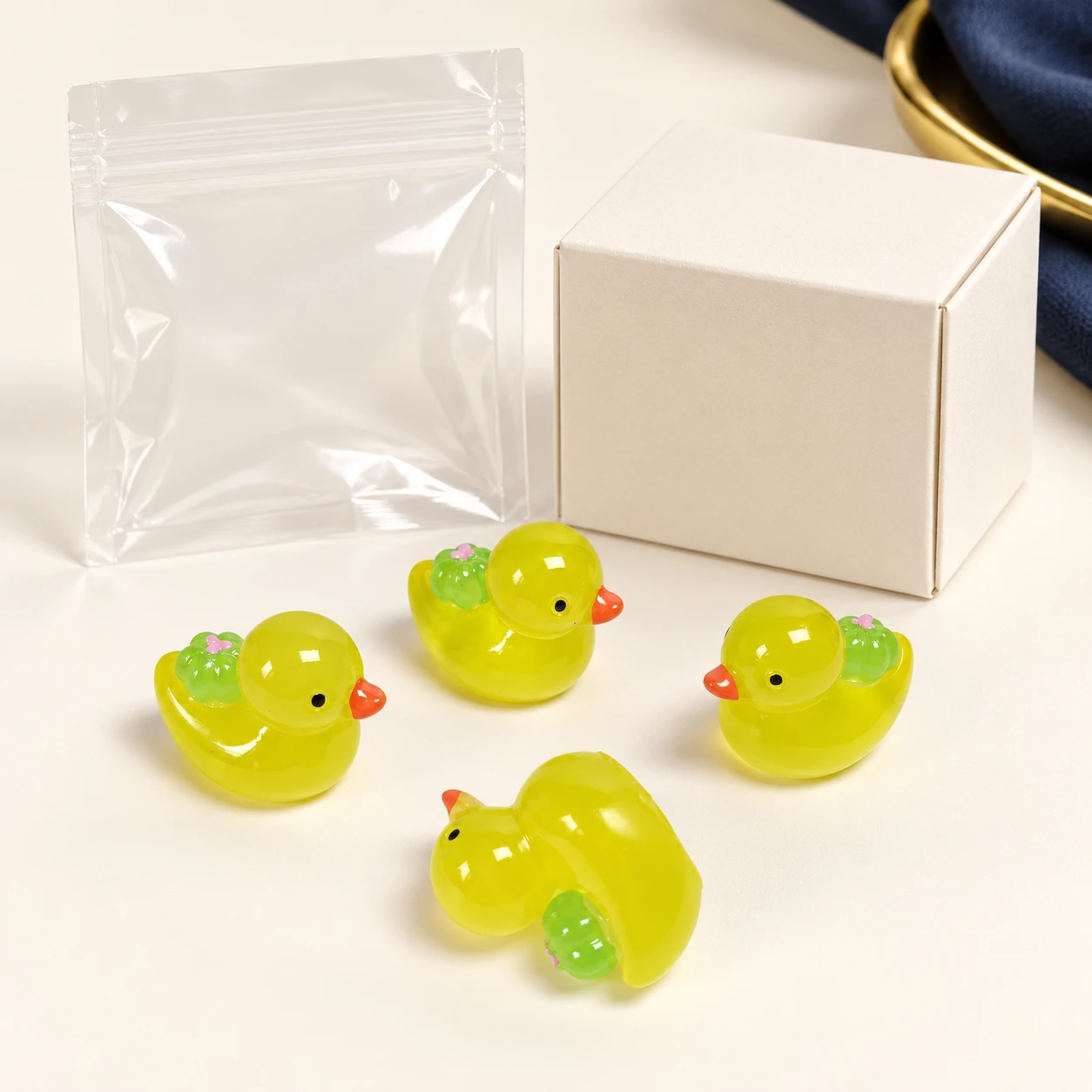 Yellow Duck Resin Charms RW001953 with illustrative private-label packaging