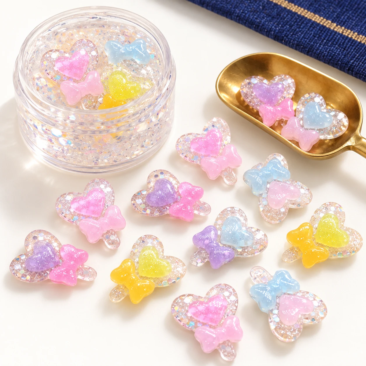 Glitter Heart & Bow Resin Charms in a slime-workspace concept, RW2041