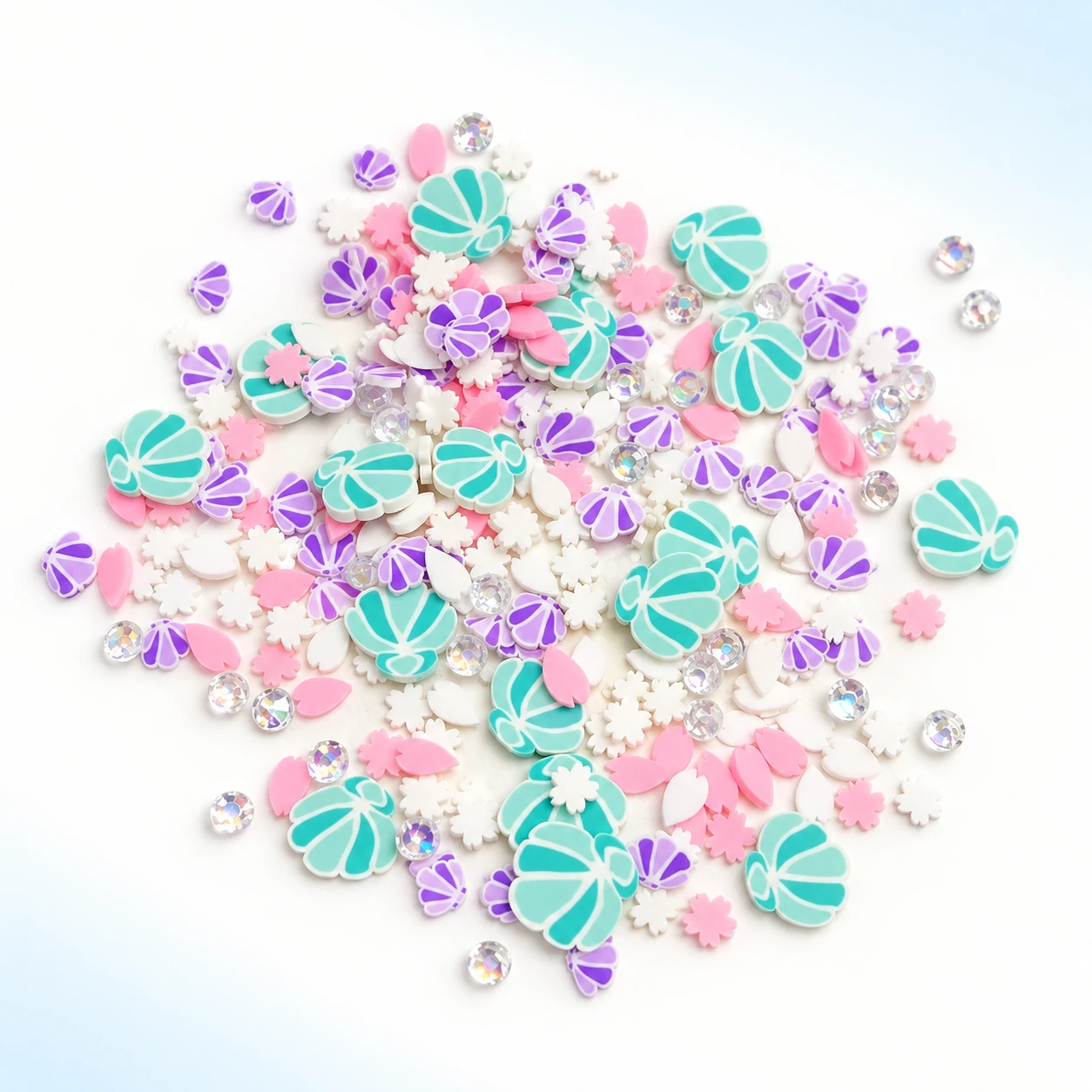 Pastel Shell Polymer Clay Slice Mix on a bright white studio background, YX720